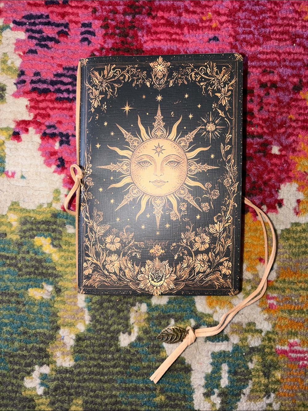 Sunface Embossed Leather Journal - Black and Gold